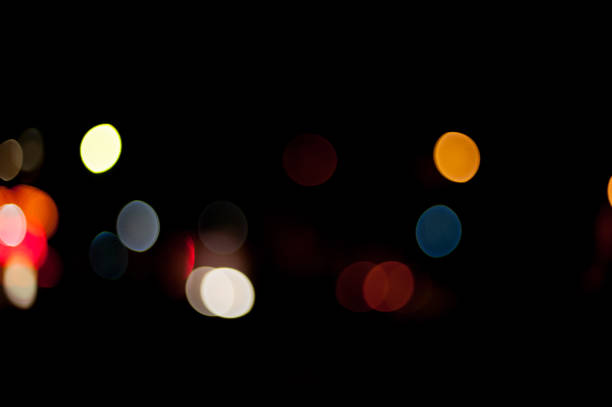istock Photo of bokeh lights on black background 878686840