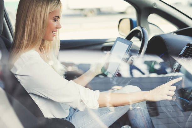 istock A young girl presses buttons on electric vehicle control devices. 878693064
