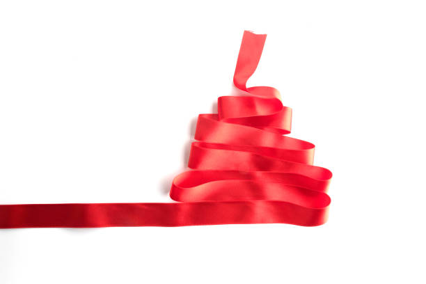 istock red bow ribbon satin texture isolated on white background 878699718