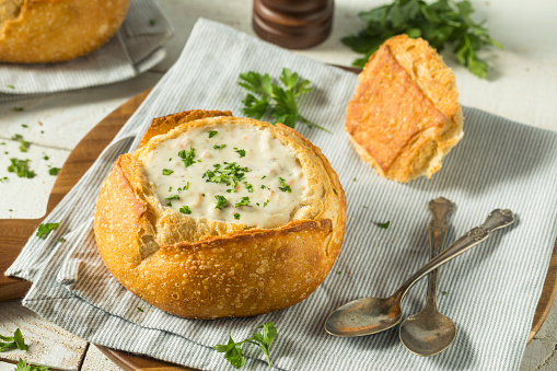 New England Clam Chowder in a Bread Bowl with Parsley