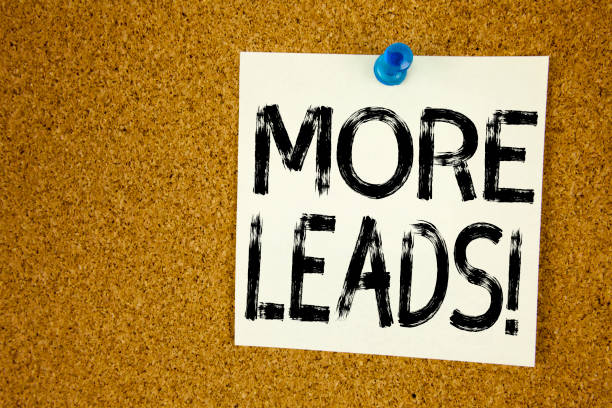 istock Conceptual hand writing text caption inspiration showing More Leads . Business concept for Get More Leads Consumer Marketing written on sticky note, reminder cork background with copy space 878717576