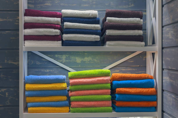 istock Multicolored towels are on the shelf. Sale 878721262
