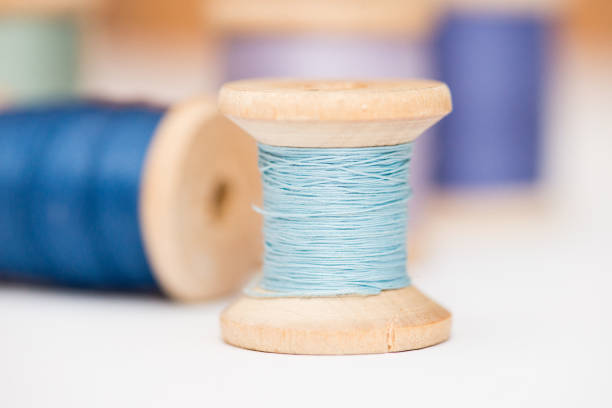 Bobbins of thread isolated on white background