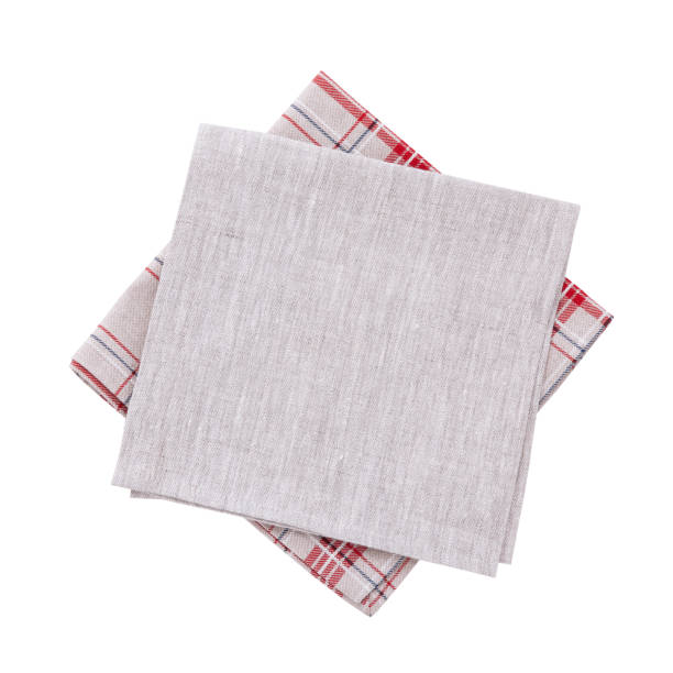 istock Napkins isolated on white. Multi-colored linen napkins for restaurant. Empty napkins mock up for design. Napkins top view close up. Place for text on napkin. 878730590