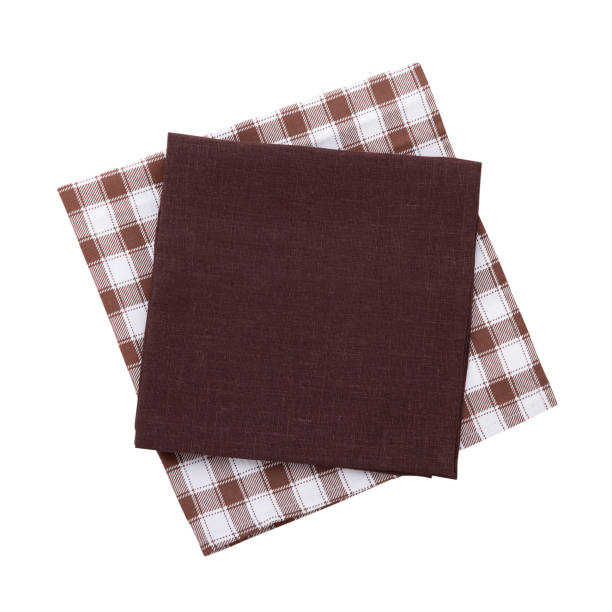 istock Napkins isolated on white. Multi-colored linen napkins for restaurant. Empty napkins mock up for design. Napkins top view close up. Place for text on napkin. 878730604