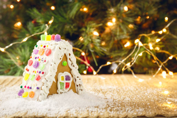 istock Gingerbread house with Christmas tree 878750674