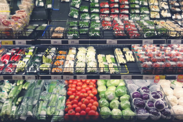 blur of Fresh organic Vegetables on shelf in supermarket