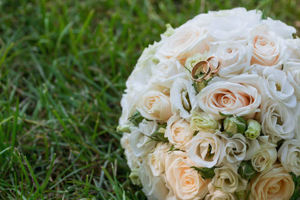 istock Beautiful wedding bouquet and rings 878797886