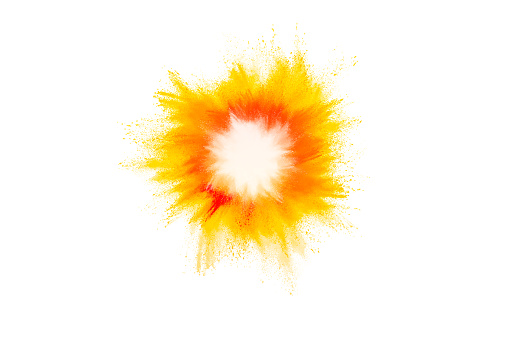 Congelar movimiento de explosiones de polvo de colores aislados sobre fondo blanco photo
