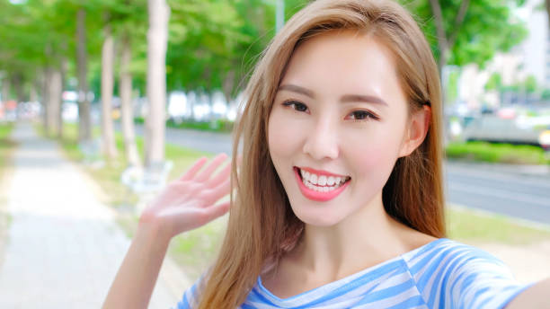 istock woman selfie happily 878803094