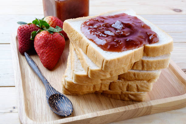 istock slice of bread with jam strawberry 878803996
