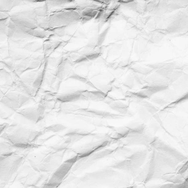 istock abstract background of crumpled white paper 878809410