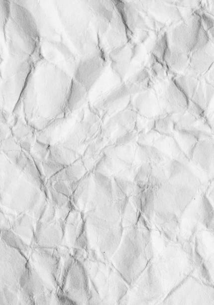 istock abstract background of crumpled white paper 878809764