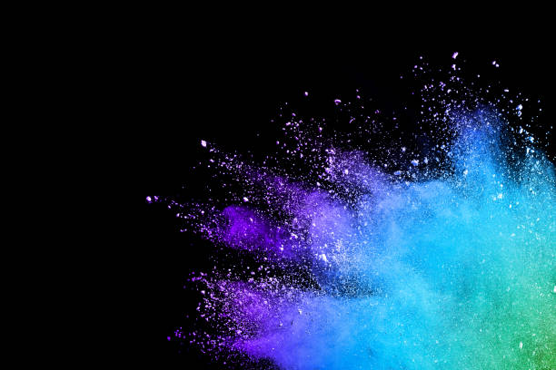 Splash of colorful powder over black background.