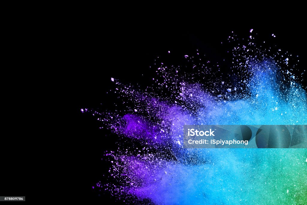 Splash of colorful powder over black background. Colors Stock Photo