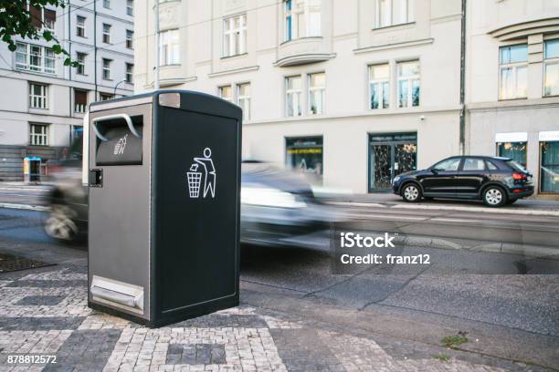 A Modern Smart Trash Can On The Street In Prague In The Czech Republic Collection Of Waste In Europe For Subsequent Disposal Ecofriendly Waste Collection In The Background The Car Is In Motion Stock Photo - Download Image Now