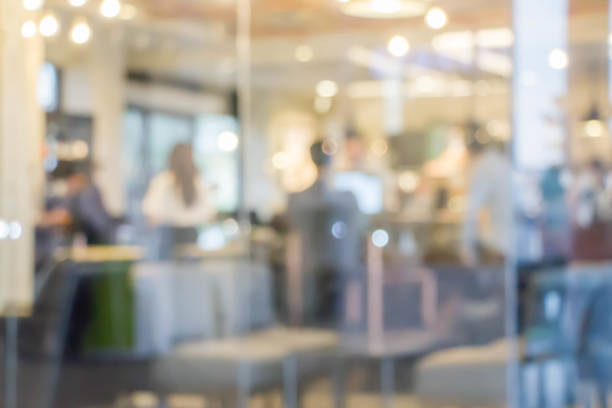 istock blurred people in coffee shop 878823510