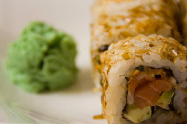 istock tuna roll detail with wasabi sauce 878840768