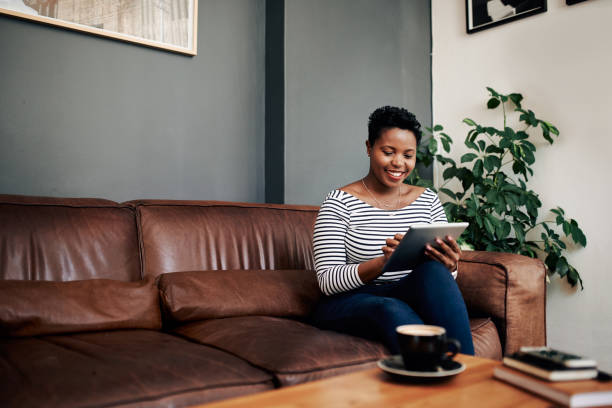 istock Making her coffee break count with free wifi 878841188