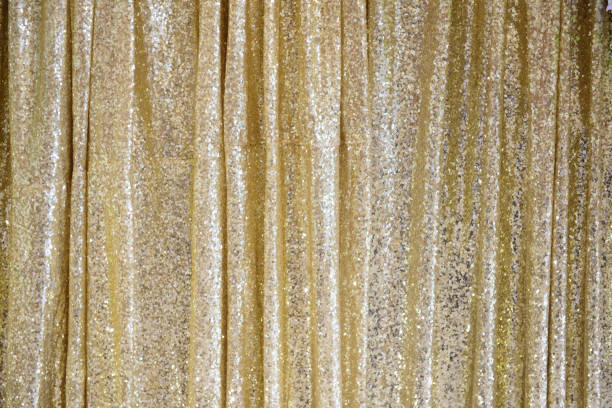 The golden glittering curtain stock photo