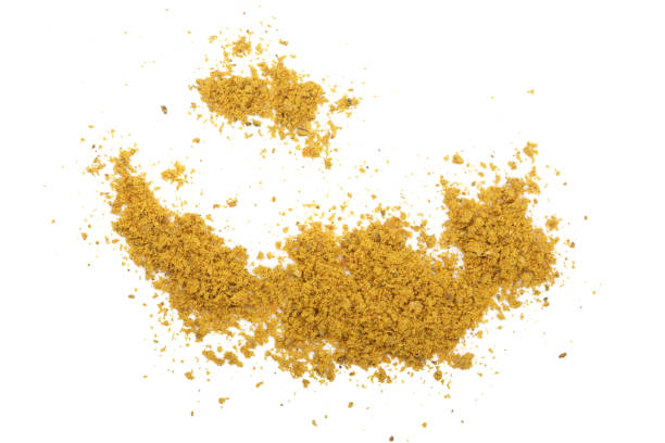 istock curry powder isolated on white background. Top view 878844160