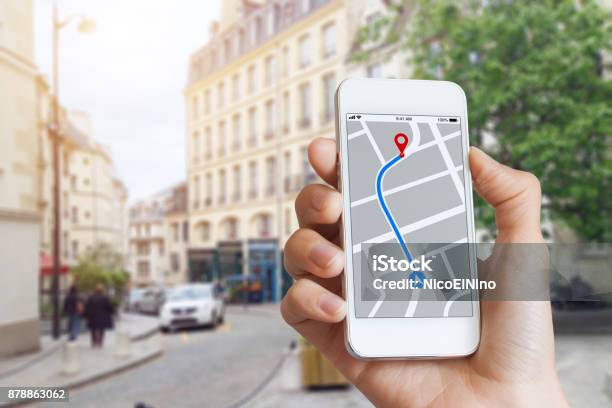 Tourist Using Gps Map Navigation App On Smartphone Screen Direction Stock Photo - Download Image Now