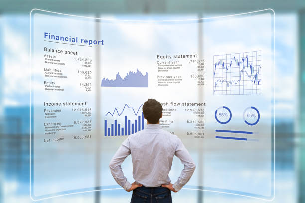 Businessman analyzing financial report data company operations, balance sheet, fintech Businessman analyzing financial report data of the company operations (balance sheet, income statement) on virtual computer screen with business charts, fintech financial advisor virtual stock pictures, royalty-free photos & images