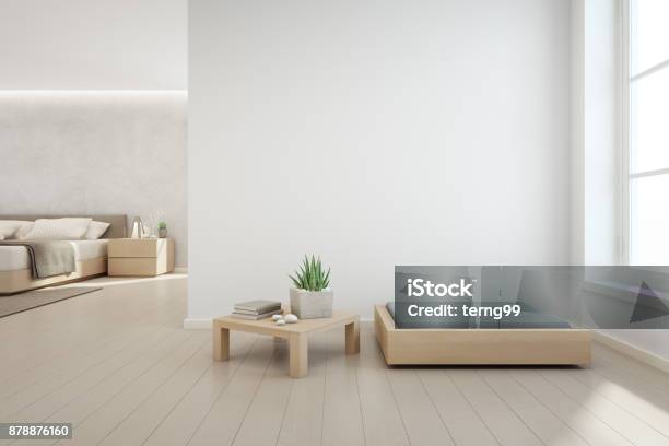 Indoor Plant On Wooden Coffee Table And Modern Furniture With Empty White Concrete Wall Background Bedroom Near Living Room In Scandinavian House Stock Photo - Download Image Now