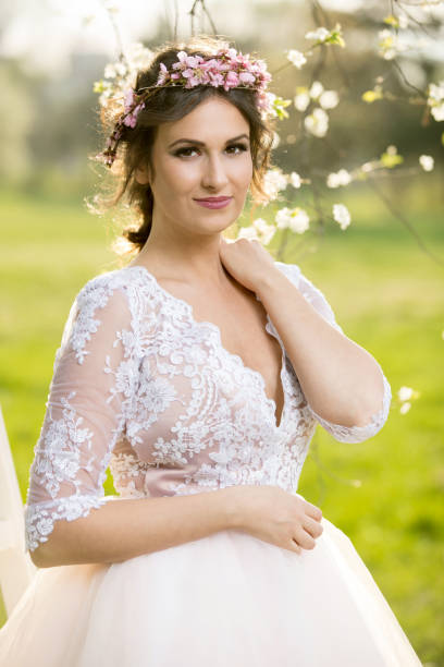istock Beautiful smiling bride wearing wreath 878876164