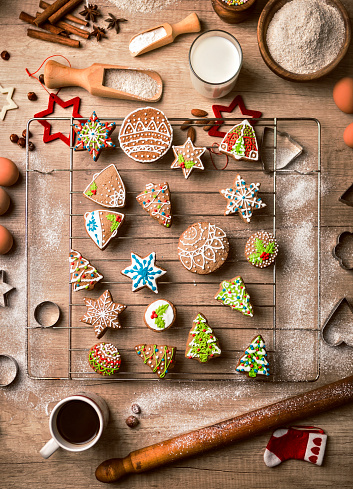 Several kinds of Christmas cookies on a glass plate, spruce twig decoration