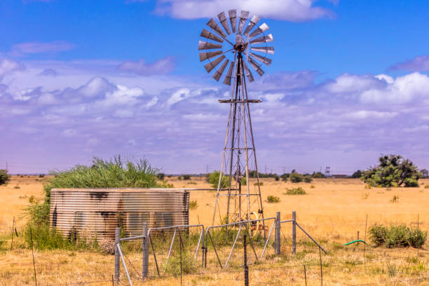 Windpump is a common site seen throughout South African rural countryside, together with the adjacent water tank to store the water for farming. A South African-style windmill.