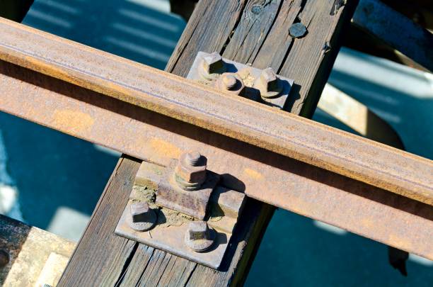 mounting of a railway track - railroad spikes imagens e fotografias de stock