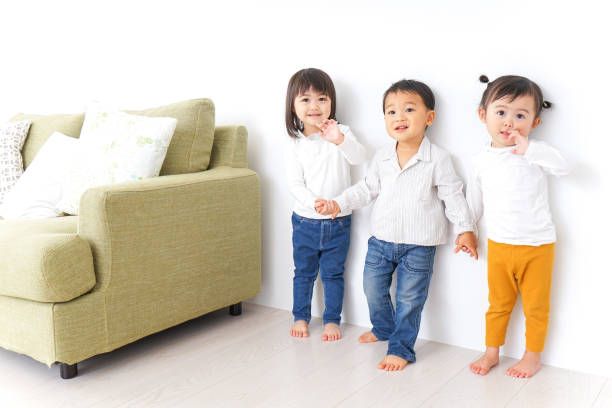 istock Children holding hands each other 878893806