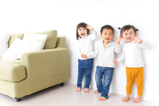 istock Children holding hands each other 878893808