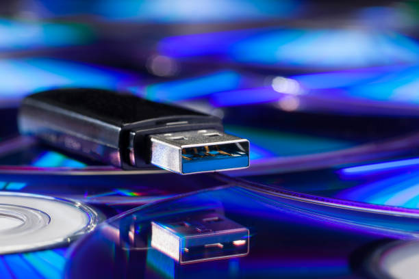 istock Usb stick on a pile of cds 878893818