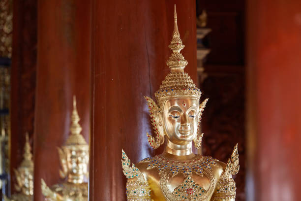 istock Golden Buddha statues, inside the temple. Chiang Mai, Thailand 878894638