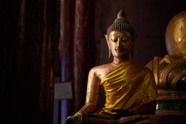 istock Golden Buddha statues, inside the temple. Chiang Mai, Thailand 878894672
