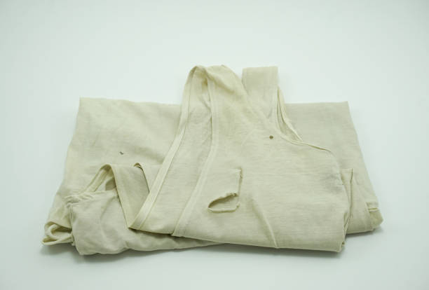 istock Old Tank Top is lacking on white background , closeup at lacking,  sufficiency economic concept 878897294