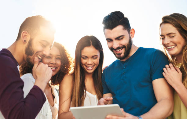 istock Laughing at videos on the internet 878897602