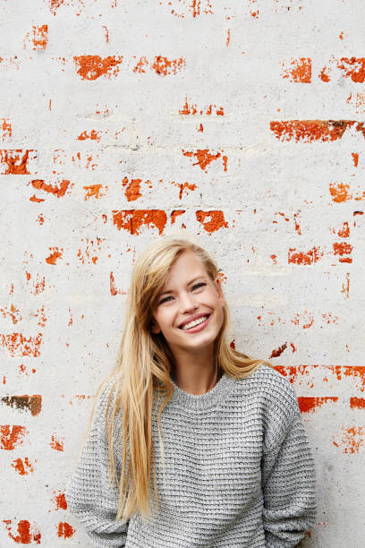 istock Grinning blond girl 878898388