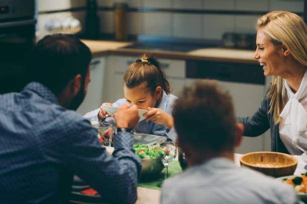 istock Family On Weekend Luch At Home 878901892