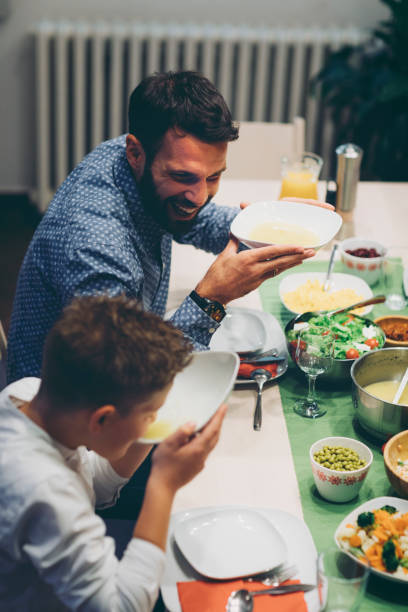 istock Family On Weekend Luch At Home 878902198