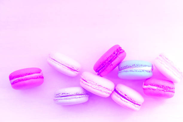 istock Macaroon. The bright colored rolls, cookies. The background substrate. 878908644
