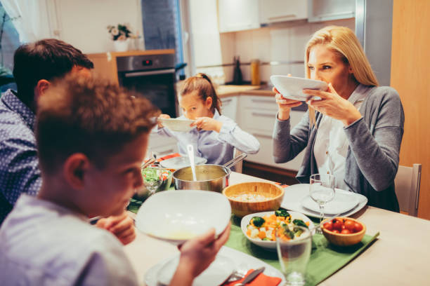 istock Family On Weekend Luch At Home 878918272