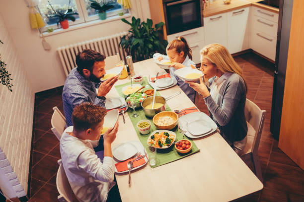 istock Family On Weekend Luch At Home 878918280