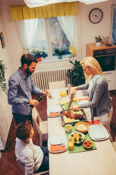 istock Family On Weekend Luch At Home 878919206