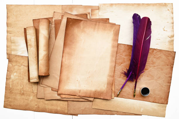istock old paper texture with feather and ink 878934410