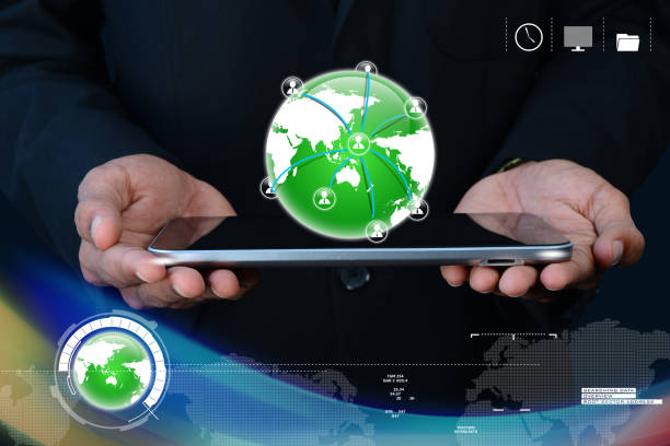 istock Businessman showing tablet with global networking 878943010