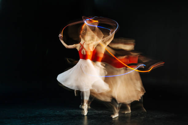 istock Nice professional dancer turning her back to you 878958518