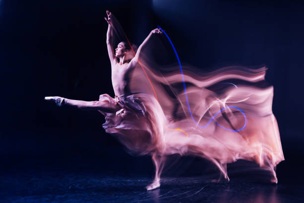 istock Beautiful gracious woman showing her performance 878961794